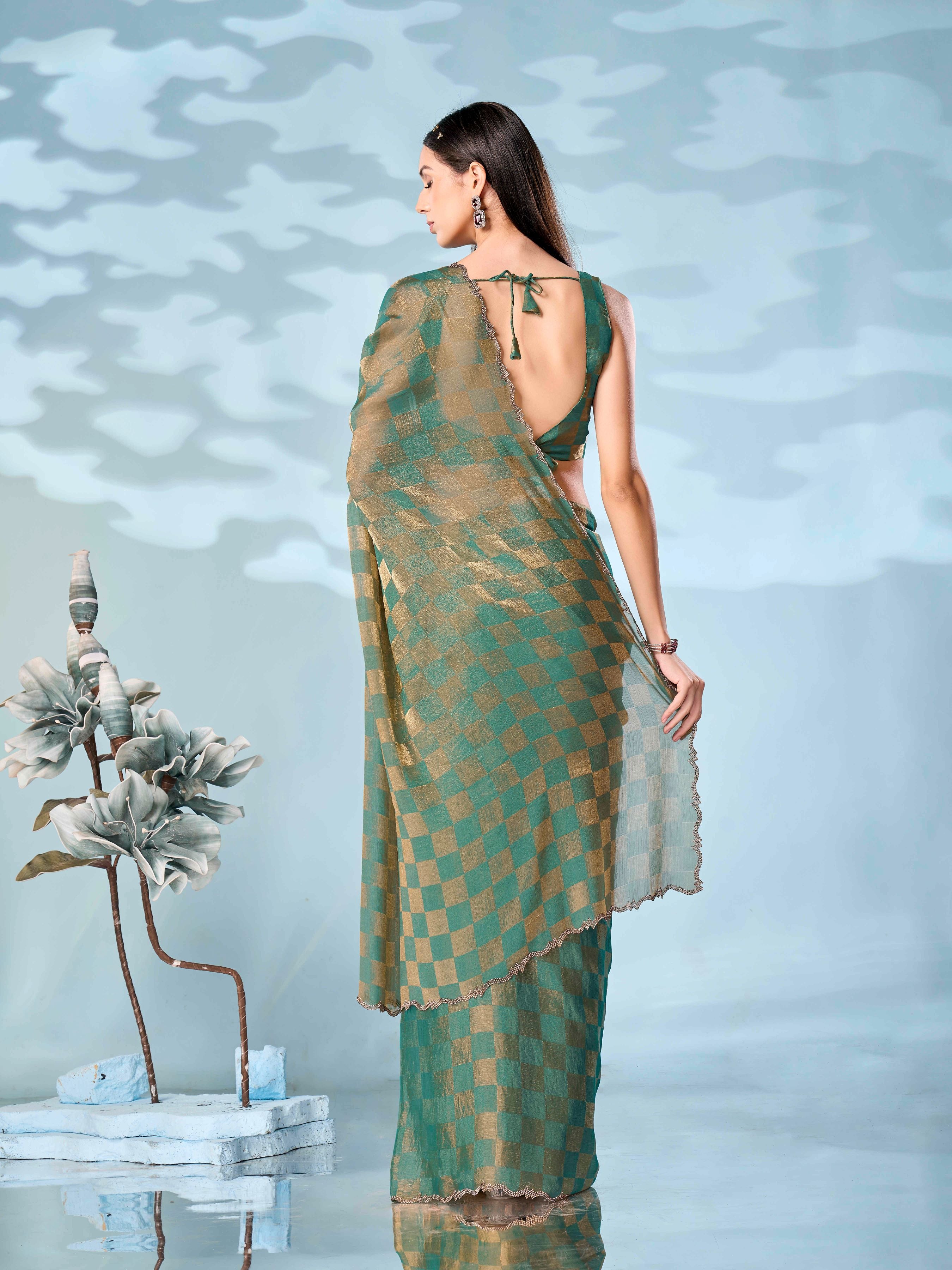 Checks pattern two tone green & golden colored designer saree with swaroski border